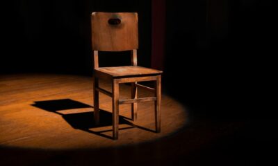 vacant brown wooden armless chair